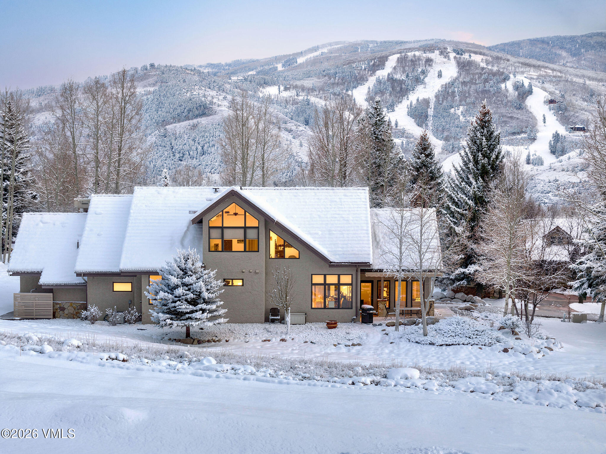 150 Buckboard Road Edwards, CO 81632 - Photo 2 of 27 a view of a house with a snow on the side of the road