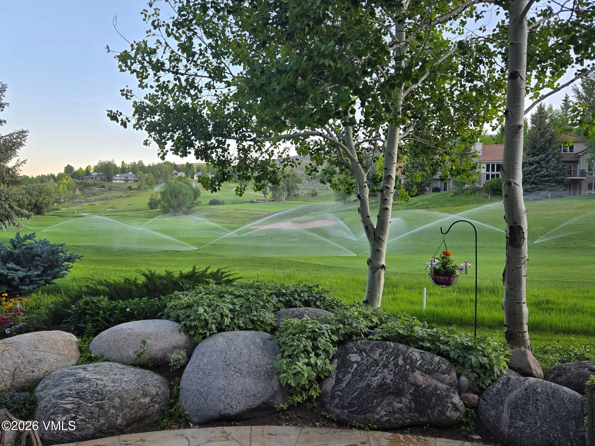 150 Buckboard Road Edwards, CO 81632 - Photo 24 of 27 a view of a garden with large trees