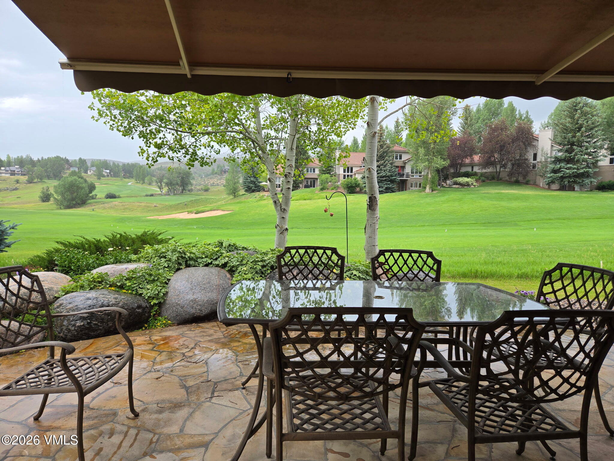 150 Buckboard Road Edwards, CO 81632 - Photo 25 of 27 a view of an outdoor sitting area with furniture and garden