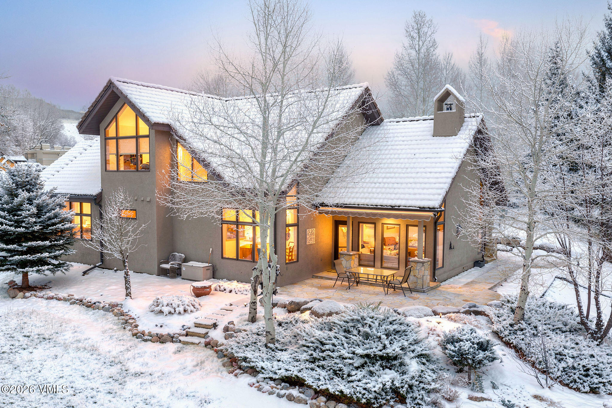 150 Buckboard Road Edwards, CO 81632 - Photo 3 of 27 a front view of a house with a yard