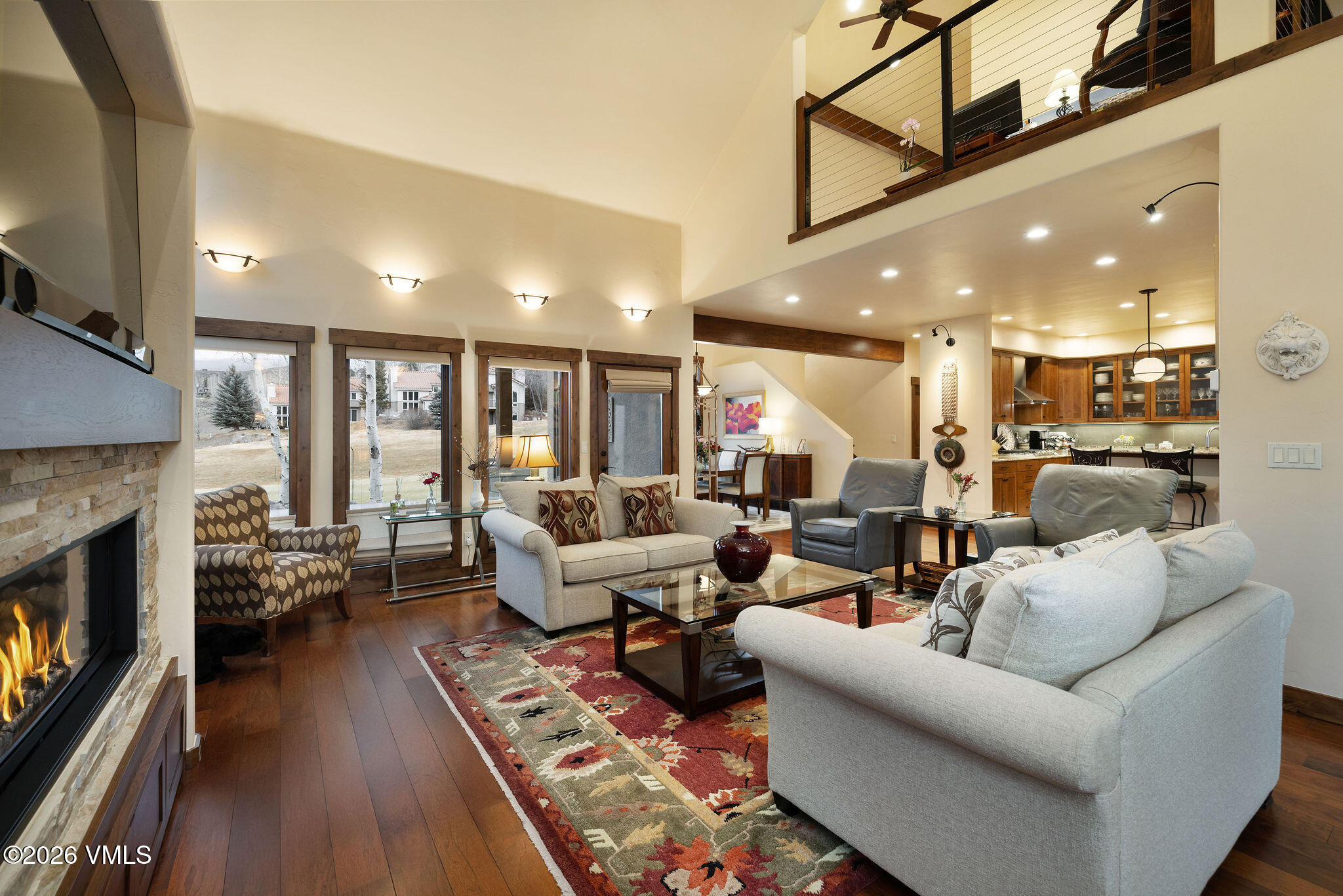 150 Buckboard Road Edwards, CO 81632 - Photo 6 of 27 a living room with furniture and a fireplace
