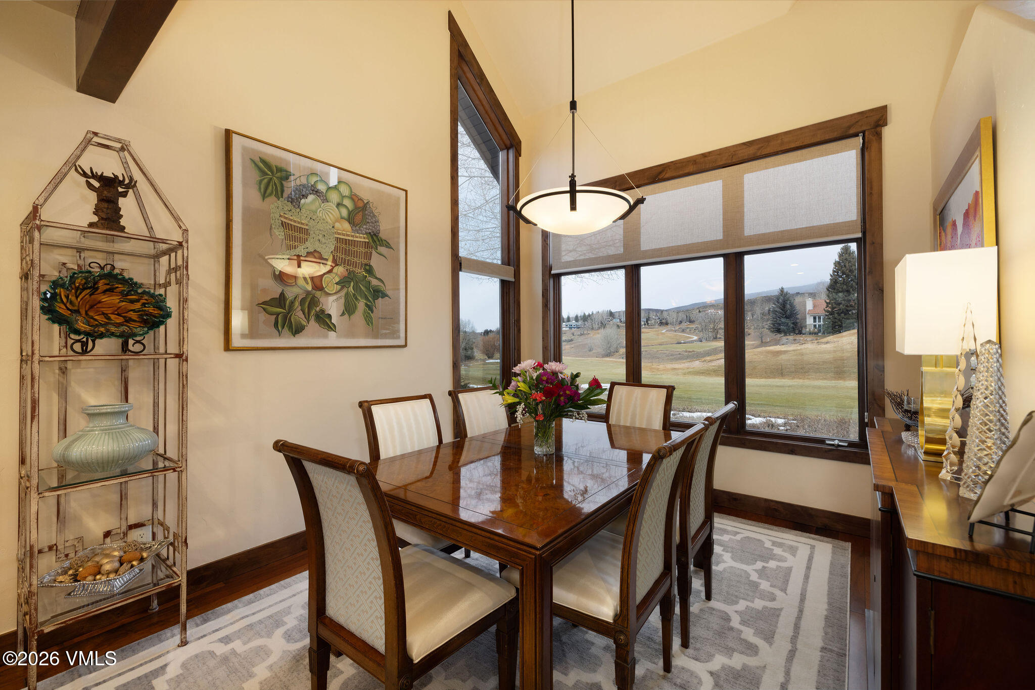 150 Buckboard Road Edwards, CO 81632 - Photo 9 of 27 a view of a dining room with furniture a chandelier and wooden floor
