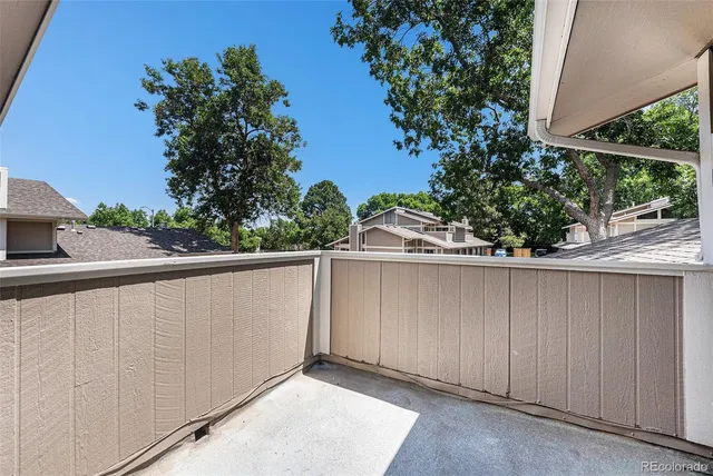 a balcony with an outdoor space