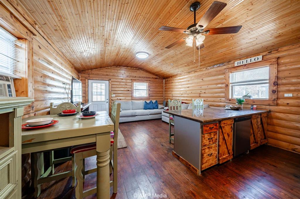 941 Harold Street Albany, TX 76430 - Photo 12 of 22 a kitchen with stove and wooden floor