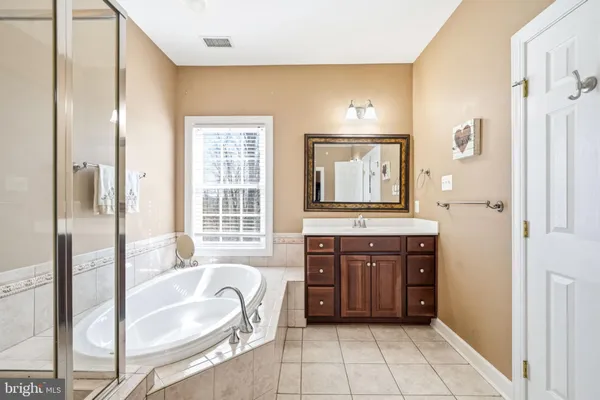 a kitchen with a sink and a refrigerator