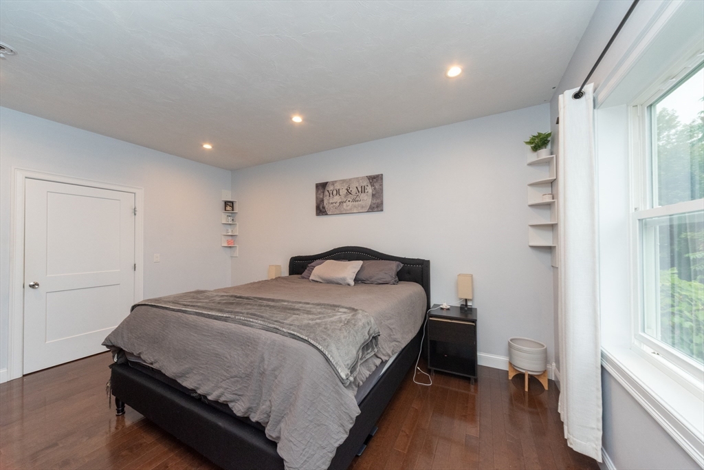 38 Norman Street Clinton, MA 01510 - Photo 15 of 40 a bed room with a bed and a window