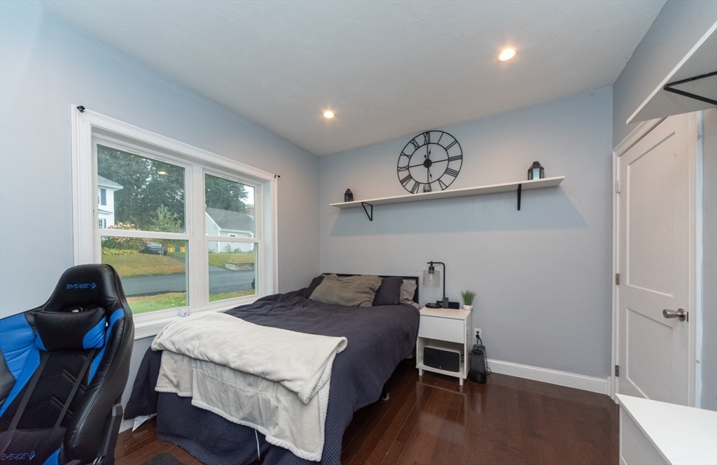 38 Norman Street Clinton, MA 01510 - Photo 19 of 40 a bedroom with a bed and a window