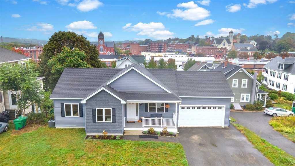 38 Norman Street Clinton, MA 01510 - Photo 2 of 40 a front view of a house with garden