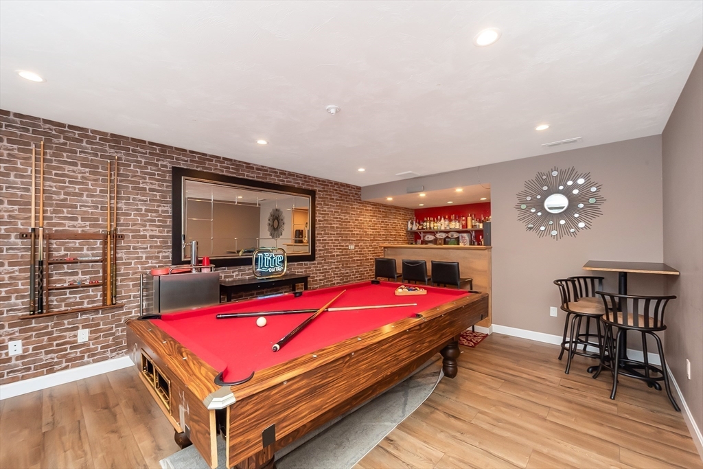 38 Norman Street Clinton, MA 01510 - Photo 21 of 40 a room with furniture pool table flat screen tv and windows