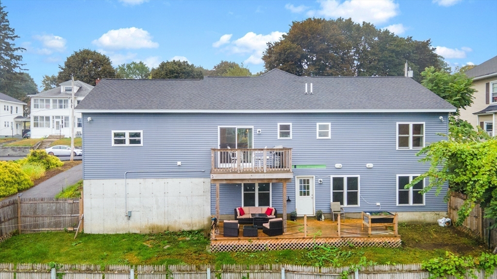 38 Norman Street Clinton, MA 01510 - Photo 4 of 40 a front view of house with yard and outdoor seating