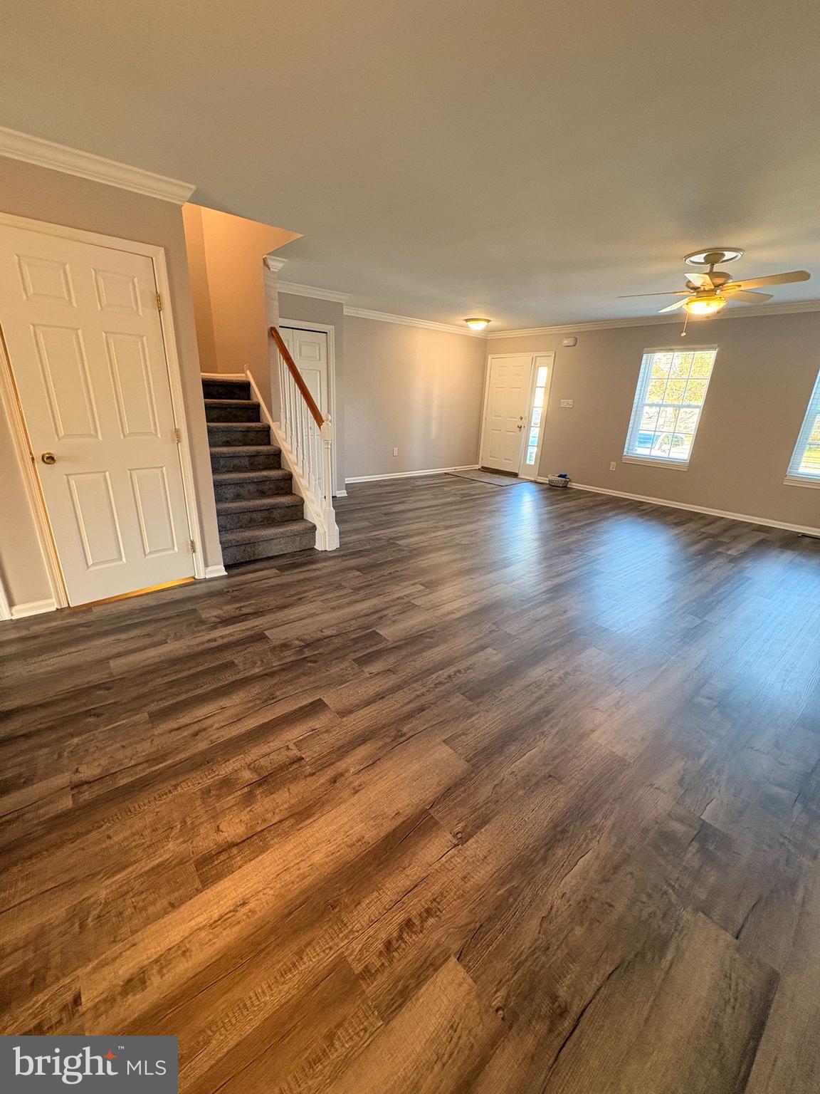 905 Kennedy Court Eagleville, PA 19403 - Photo 4 of 28 a view of an empty room with wooden floor and a window