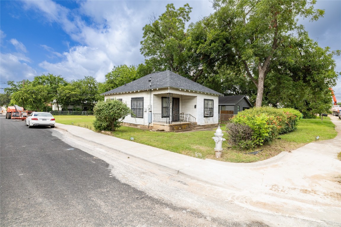 1909 East 14th Street Austin, TX 78702 - Photo 2 of 15 a front view of a house with a yard