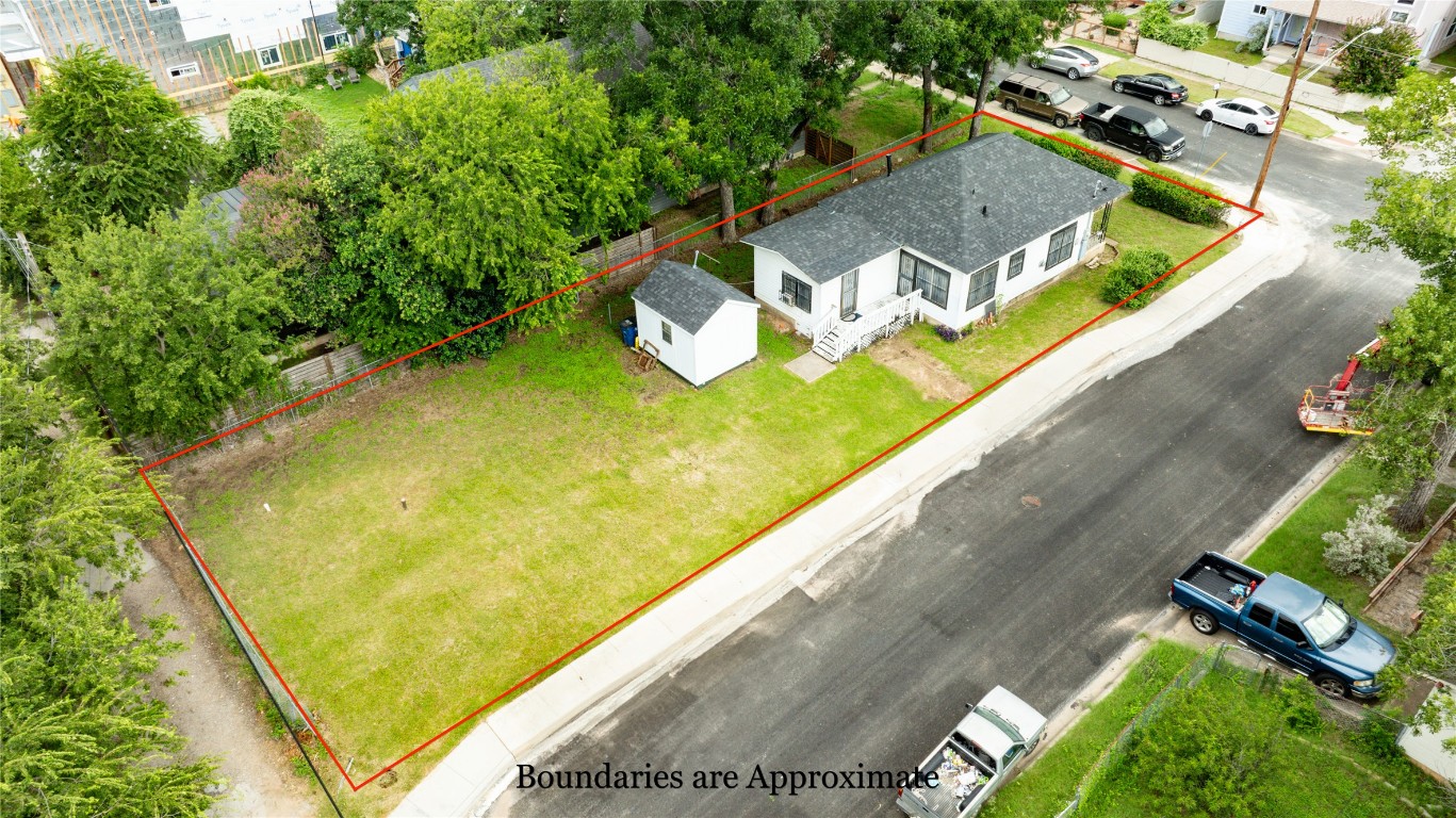 1909 East 14th Street Austin, TX 78702 - Photo 9 of 15 an aerial view of a house with a swimming pool
