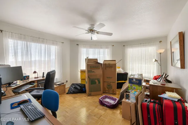 a room with furniture and a window