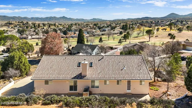 a view of a city with an ocean