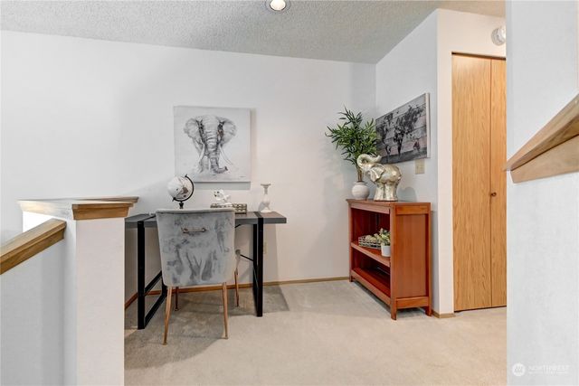 a view of a room with closet and a potted plant