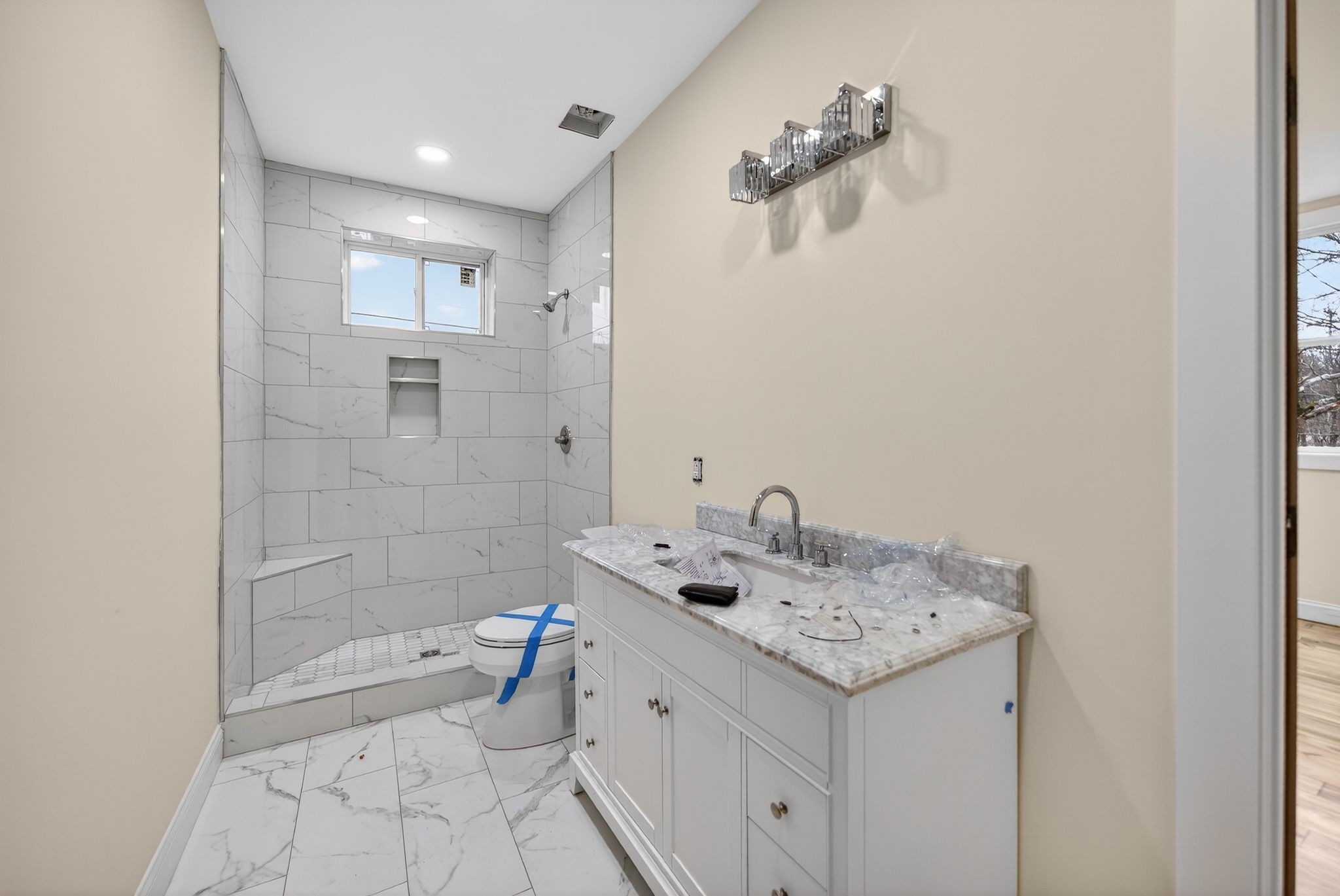 410 3rd Avenue Fayetteville, TN 37334 - Photo 37 of 49 a bathroom with a sink a toilet and shower