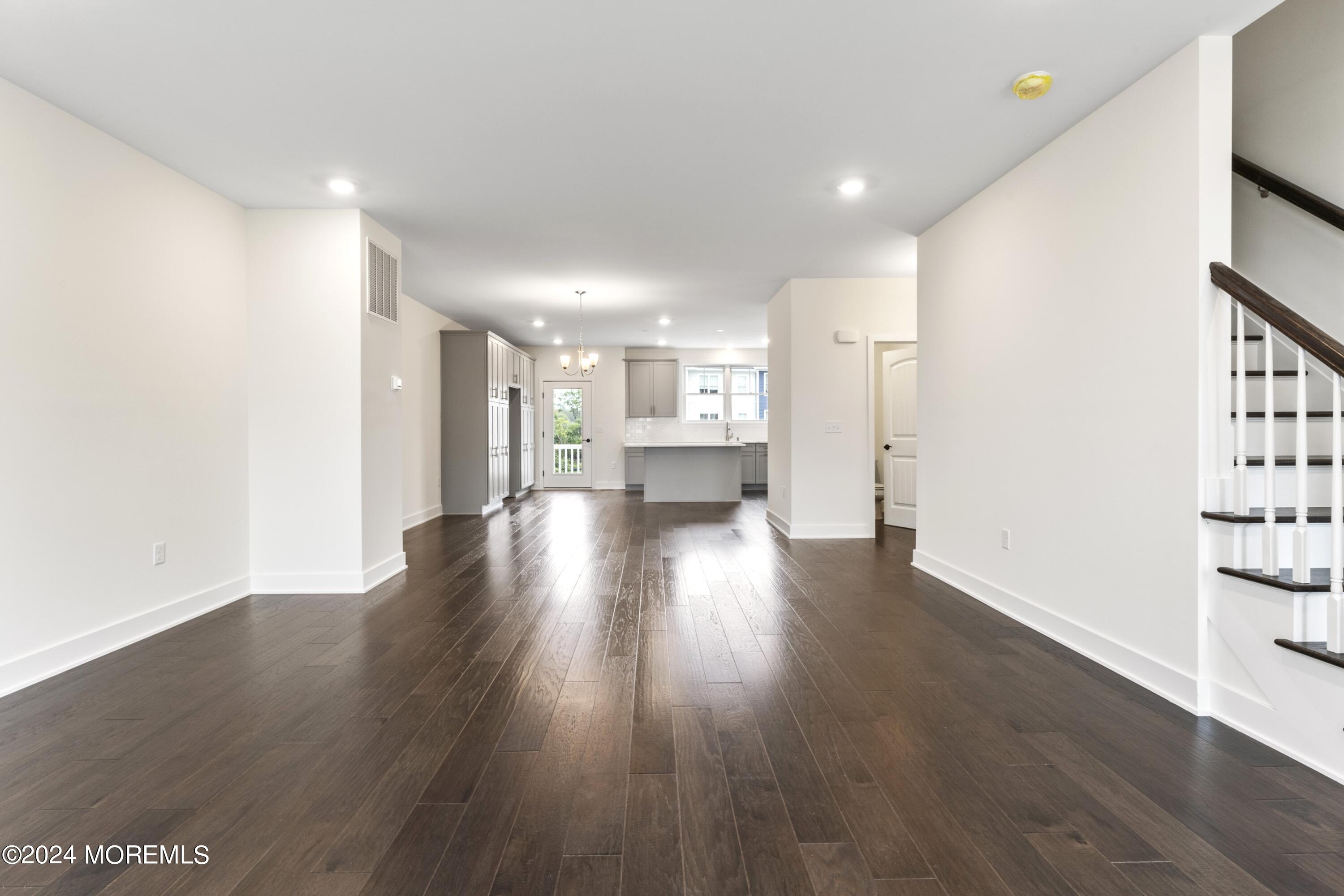 25 Raritan Cove Keyport, NJ 07735 - Photo 12 of 50 a view of empty room with wooden floor