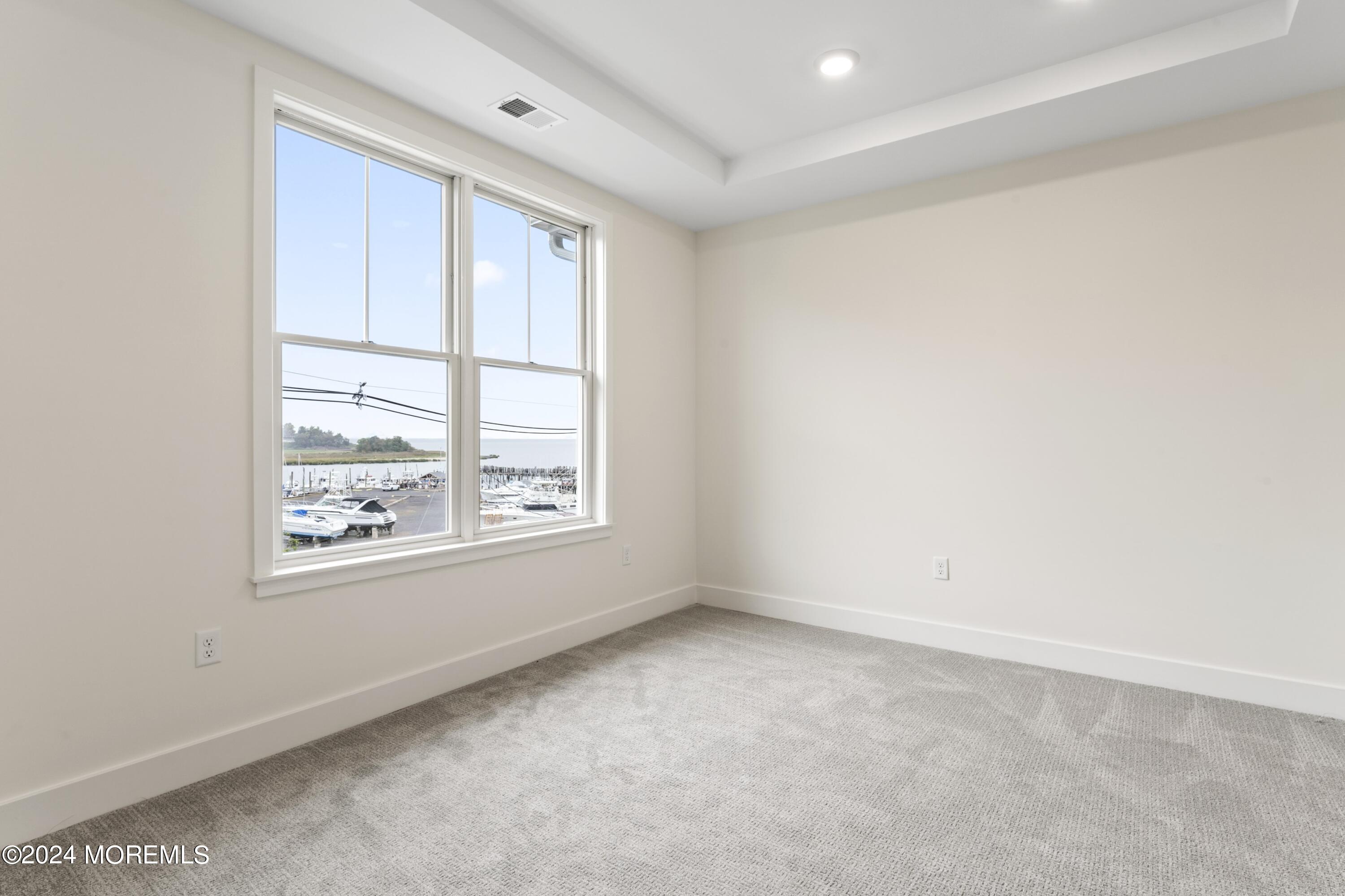 25 Raritan Cove Keyport, NJ 07735 - Photo 21 of 50 an empty room with windows