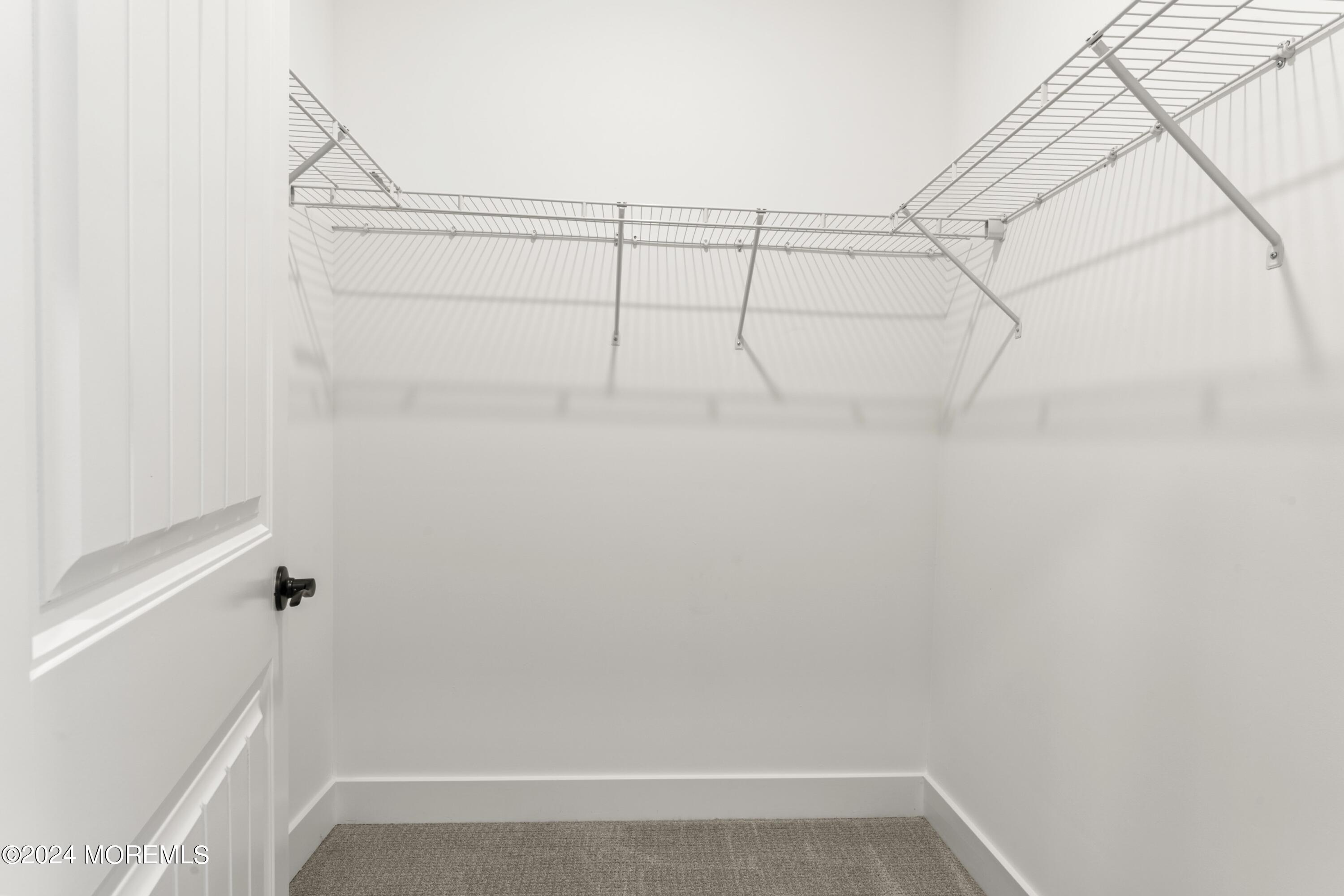 25 Raritan Cove Keyport, NJ 07735 - Photo 25 of 50 a view of small space with racks on the wall