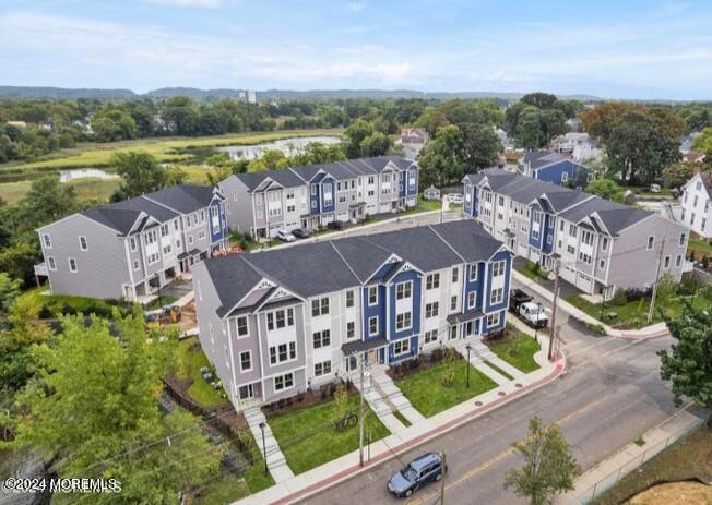 25 Raritan Cove Keyport, NJ 07735 - Photo 3 of 50 an aerial view of a house with outdoor space and lake view