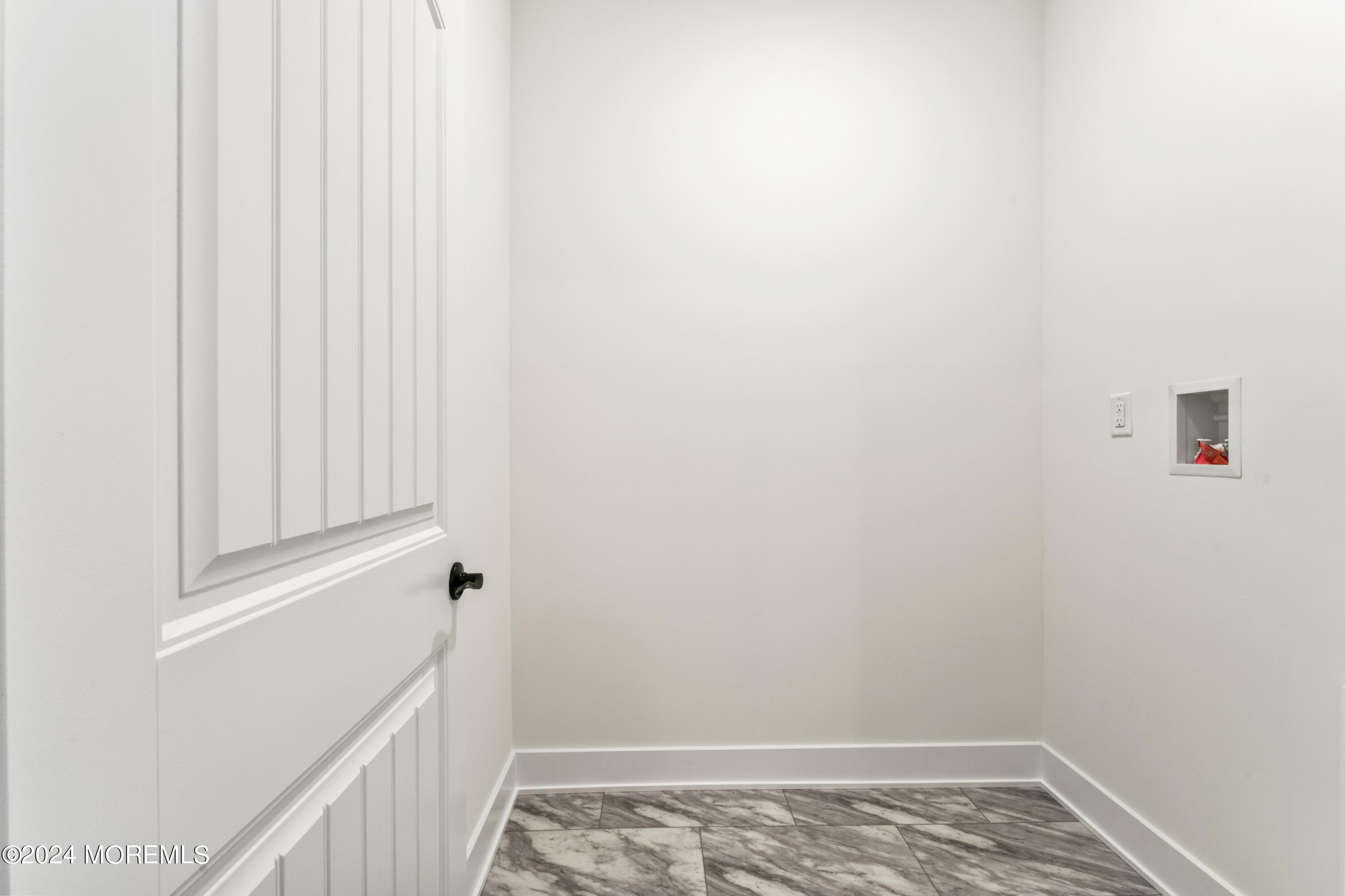 25 Raritan Cove Keyport, NJ 07735 - Photo 31 of 50 a view of small space with racks on the wall