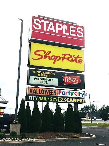 25 Raritan Cove Keyport, NJ 07735 - Photo 45 of 50 a sign on the side of a building