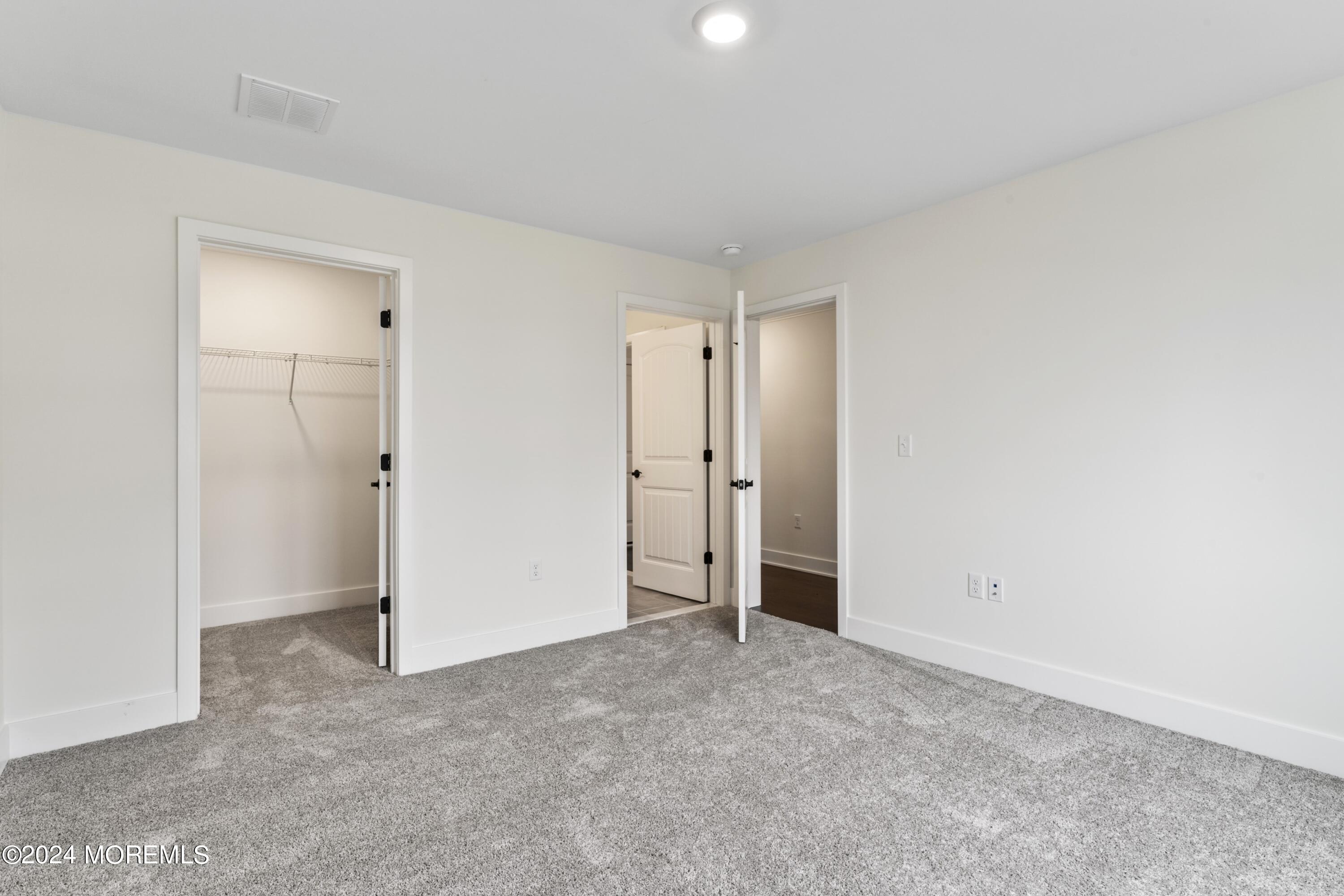 25 Raritan Cove Keyport, NJ 07735 - Photo 7 of 50 an empty room with closet area