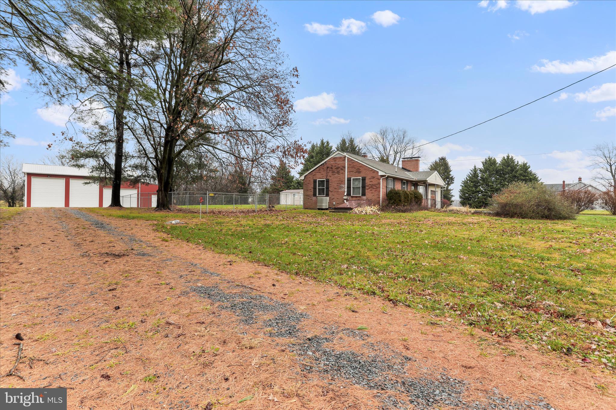 Second driveway leading to impressive pole barn