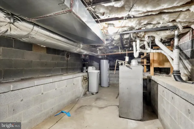 a utility room with cabinets