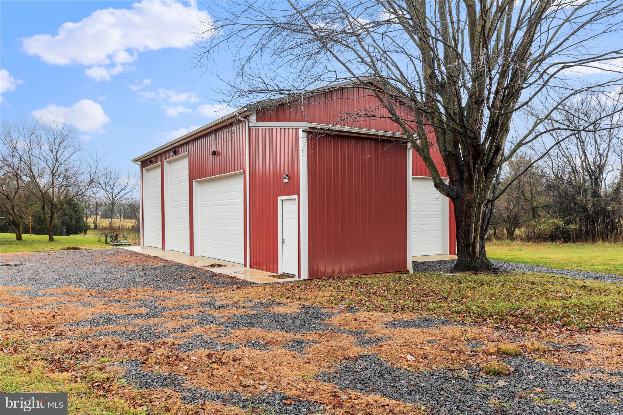 4381 Engle Molers Road Shepherdstown, WV 25443 - Photo 22 of 42 FOUR overhead garage doors offer many options