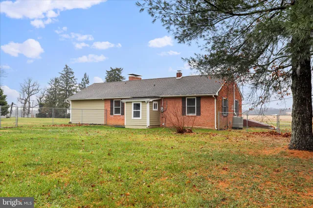 a house view with a garden space