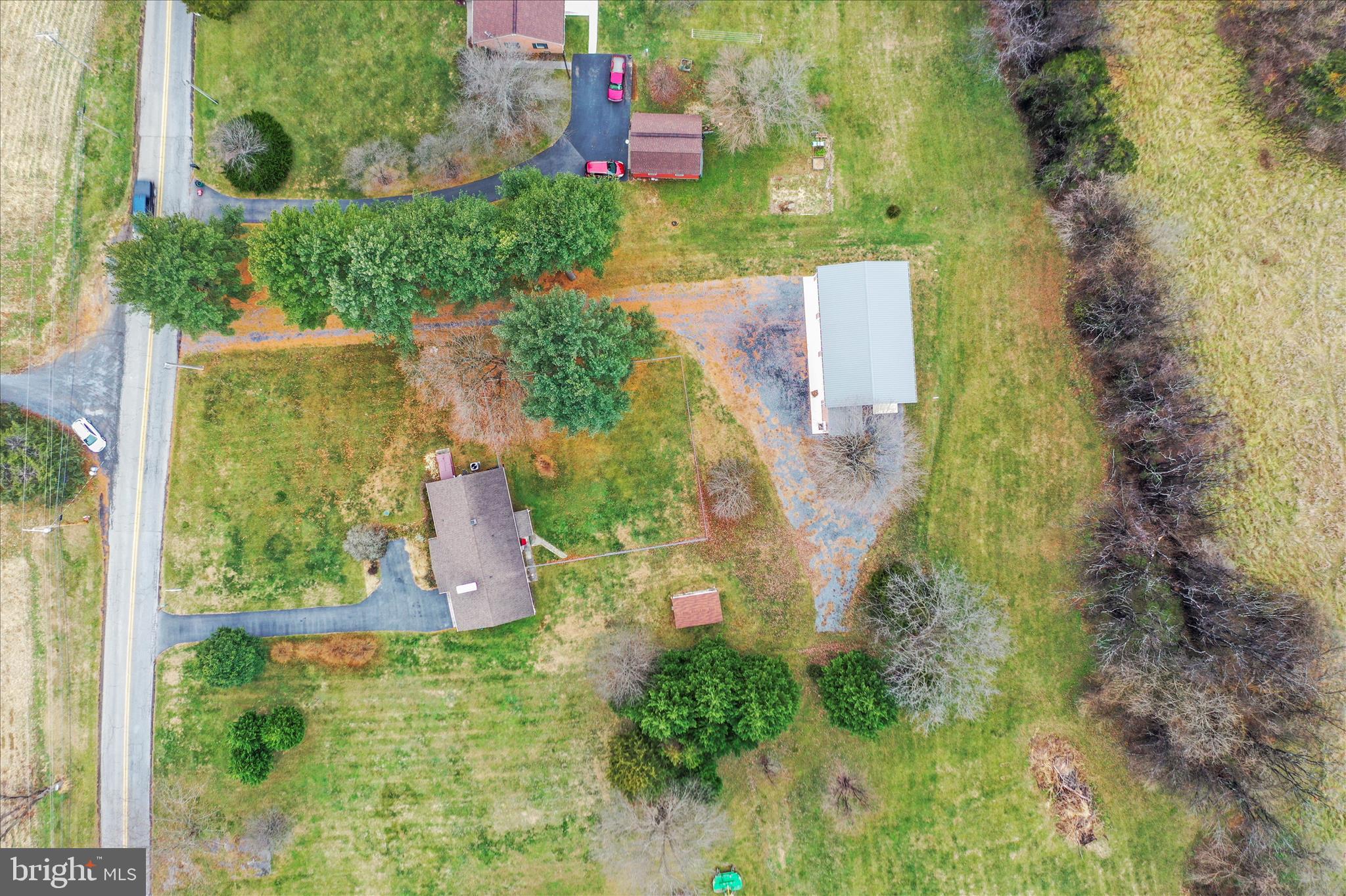4381 Engle Molers Road Shepherdstown, WV 25443 - Photo 37 of 44 an aerial view of residential house with outdoor space and trees all around