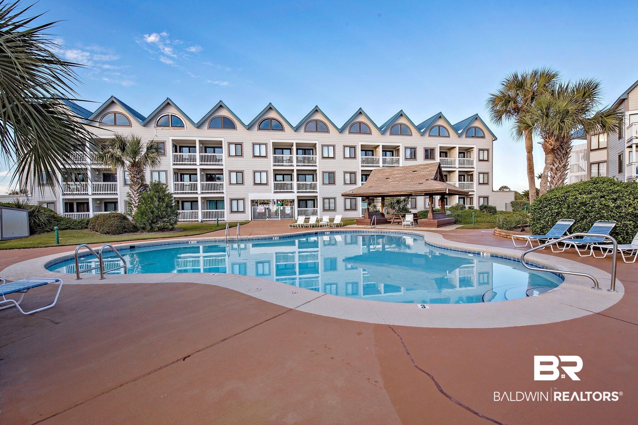 497 Plantation Road, Unit 1156 Gulf Shores, AL 36542 - Photo 1 of 28 View of swimming pool featuring a gazebo and a patio area