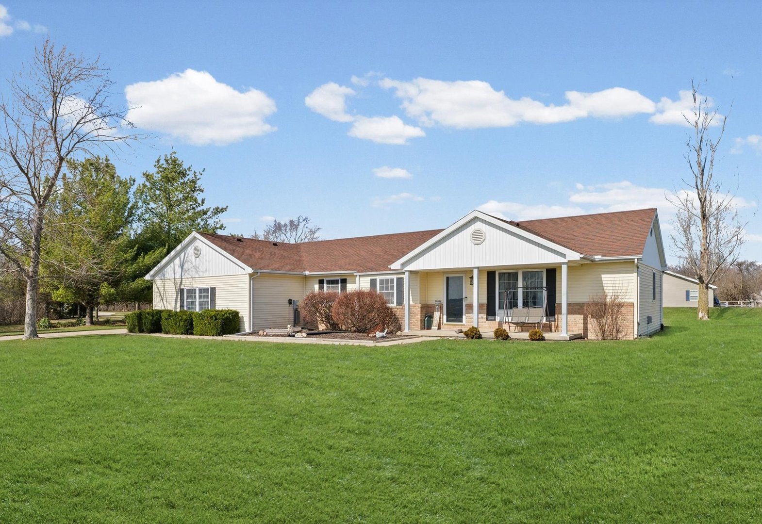 29 Falcon Pass Camargo, IL 61919 - Photo 3 of 27 a front view of a house with a yard and trees