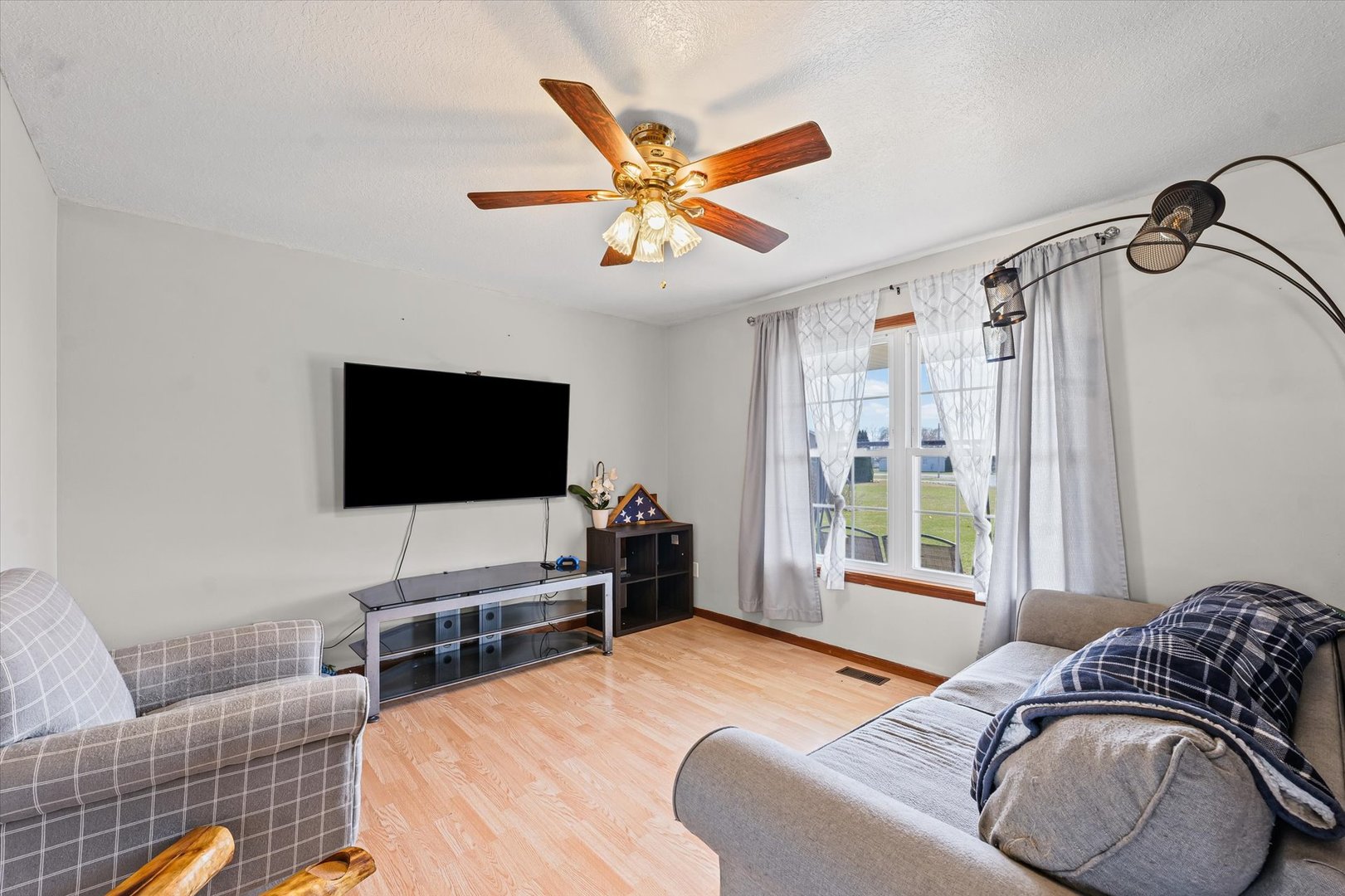 29 Falcon Pass Camargo, IL 61919 - Photo 6 of 27 a bedroom with a bed and a flat screen tv