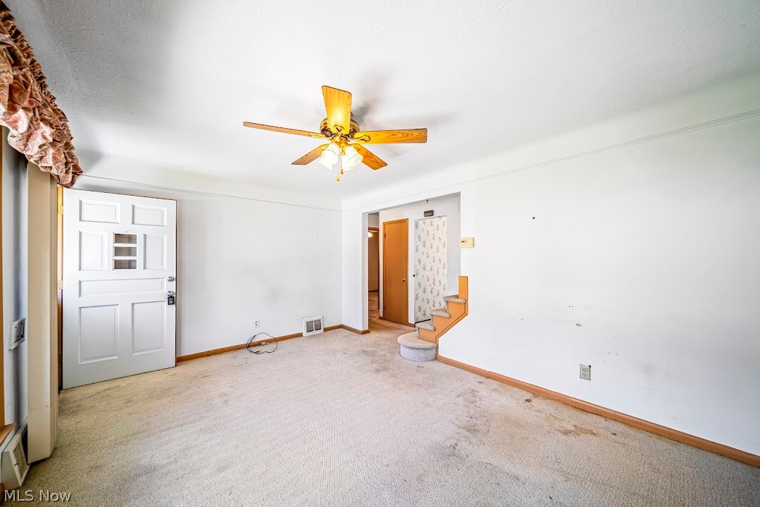 1738 Rockefeller Road Wickliffe, OH 44092 - Photo 15 of 35 Carpeted spare room featuring ceiling fan