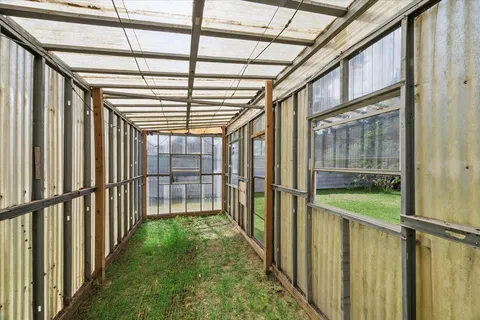 a view of porch with wooden floor and stairs