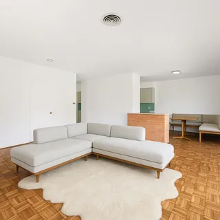 a living room with furniture and a couch