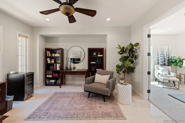 a view of a dining room with furniture wooden floor and chandelier