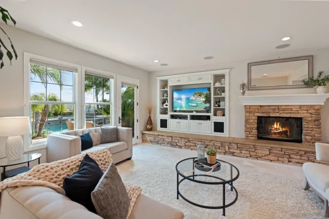 a spacious bedroom with a bed and a large window