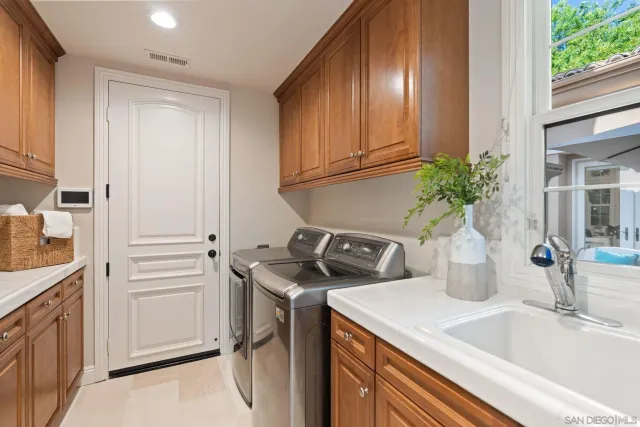 a view of a backyard with sitting area