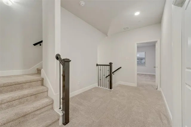 a view of entryway with stairs