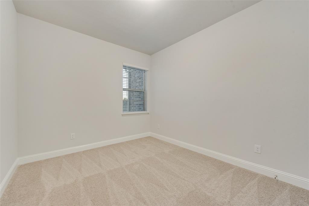 7853 Sunset Boulevard Rowlett, TX 75088 - Photo 20 of 31 an empty room with a window