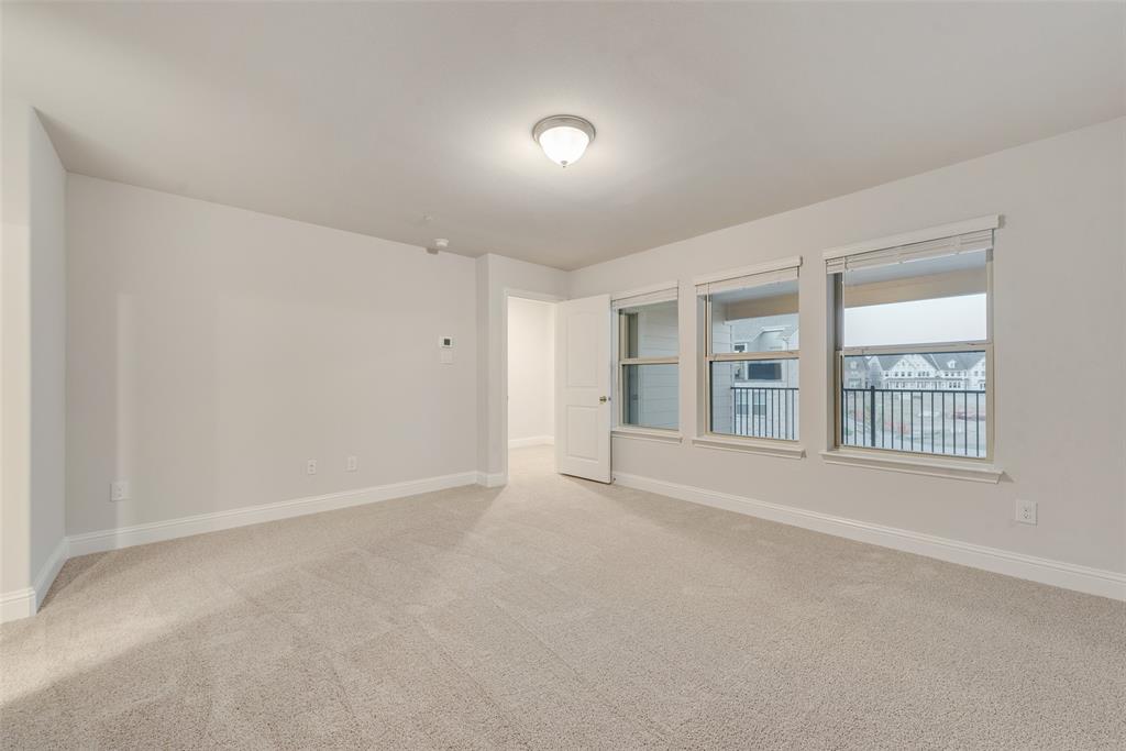 7853 Sunset Boulevard Rowlett, TX 75088 - Photo 22 of 31 a view of an empty room with a window