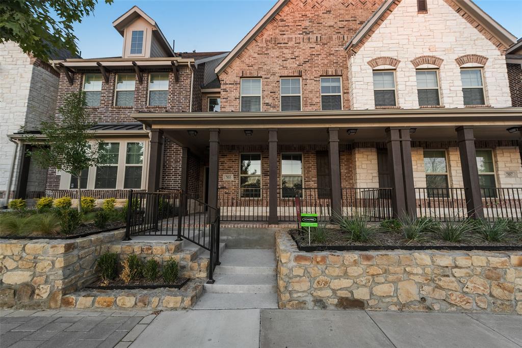 7853 Sunset Boulevard Rowlett, TX 75088 - Photo 25 of 31 a view of a brick building with many windows