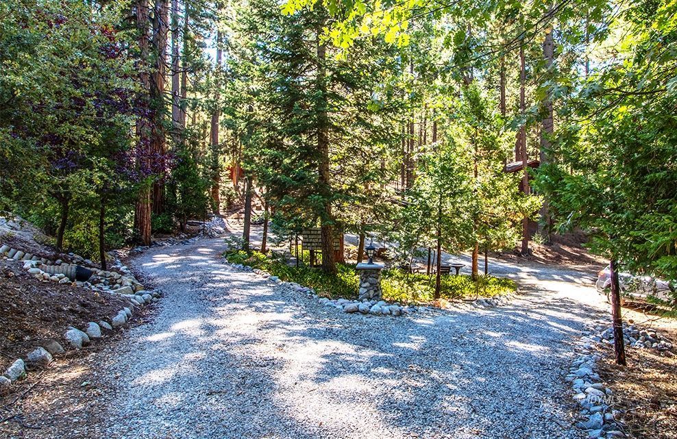 27401 Saunders Meadow Road Idyllwild, CA 92549 - Photo 2 of 37 a view of swimming pool with a yard