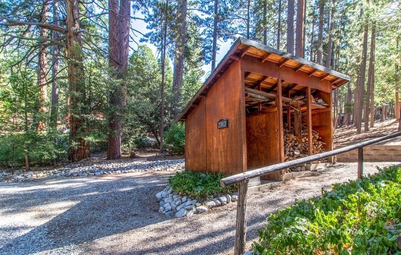 27401 Saunders Meadow Road Idyllwild, CA 92549 - Photo 4 of 37 a front view of house with pathway and yard