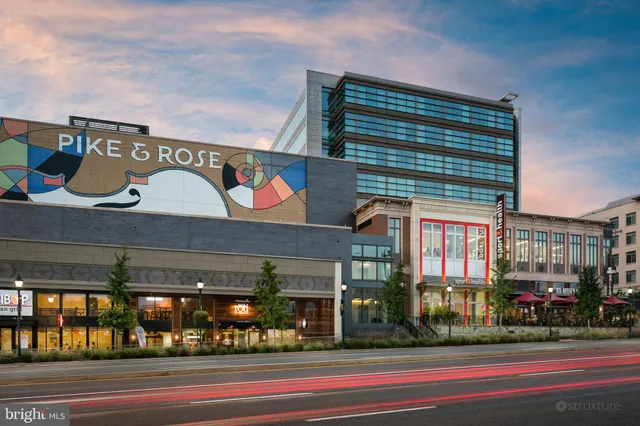 a street sign on a pole on a street