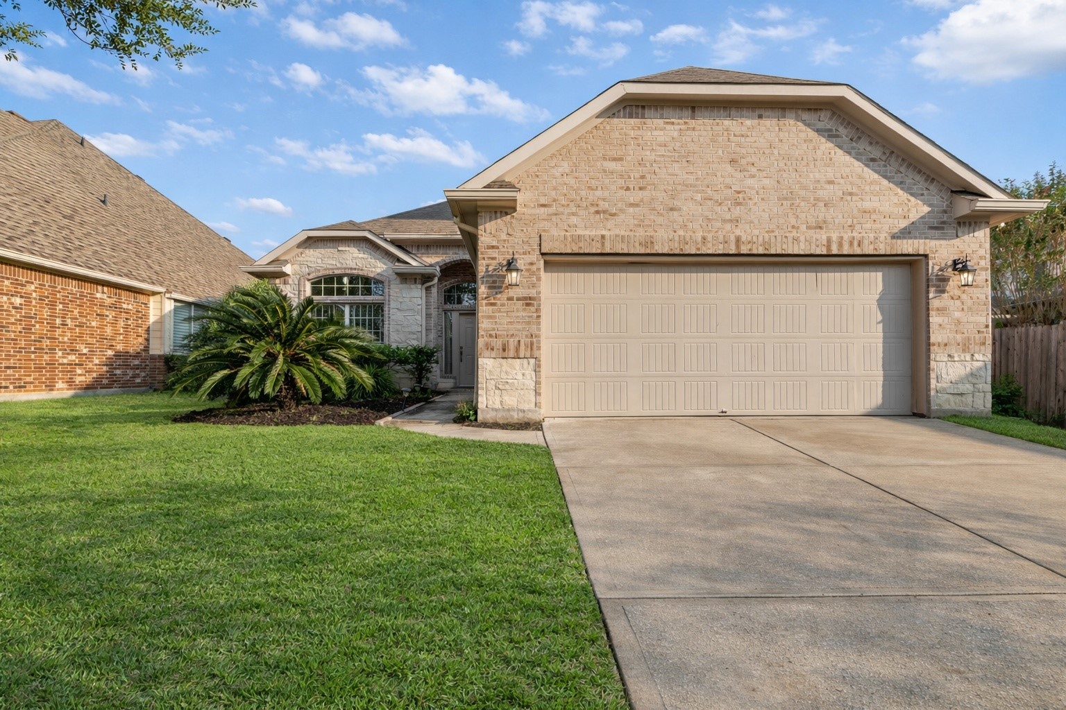 155 Magnolia Grove Lane Conroe, TX 77384 - Photo 1 of 25 Well-maintained two-story home offering abundant natural light in Jacobs Reserve!